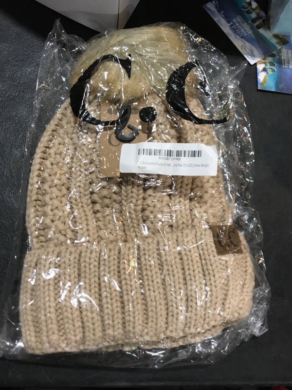 Photo 1 of beige beanie hat 