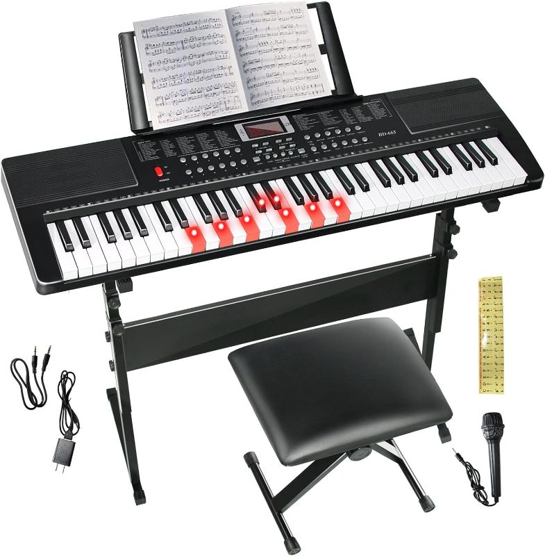 Photo 1 of Keyboard Piano 61 Key Electric Piano Keyboard for Beginners/Professional, Portable Light Up Music Keyboard Built-in Dual Speakers with LED Display, Music Stand, Stand, Microphone, Bench (A)
