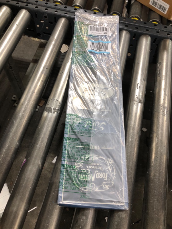 Photo 1 of Ford Logo Evolution Vertical Embossed Metal Sign - Vintage Ford Sign for Garage or Man Cave Black/Blue