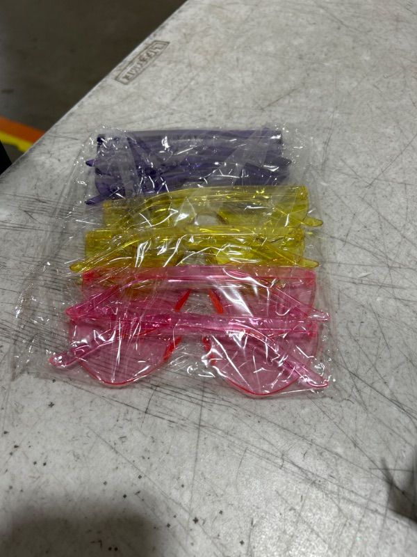 Photo 1 of AOMASTE 6 Peices Heart Sunglasses Rimless Transparent Heart Shaped Glasses Candy Color Eyewear for Women Party Favor (2 Pink, 2 Purple, 2 Yellow)