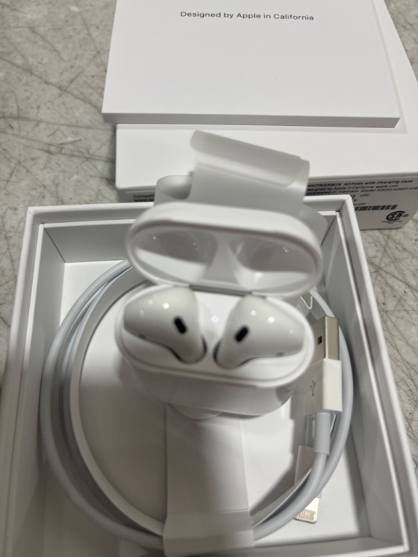 Photo 3 of Apple AirPods (2nd Generation) Wireless Ear Buds, Bluetooth Headphones with Lightning Charging Case Included, Over 24 Hours of Battery Life, Effortless Setup for iPhone - sealed open for photos -+
