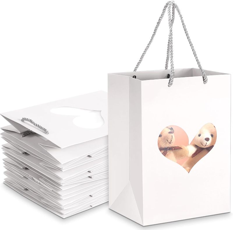 Photo 1 of 12 Pcs Valentine's Day Gift Bags with Handles Heart Shaped Paper Bags 9.84 X7.0 X5.12 Inches Gift Wrap Bag for Valentine's Day, Wedding Valentine Party Favors Anniversary(White)