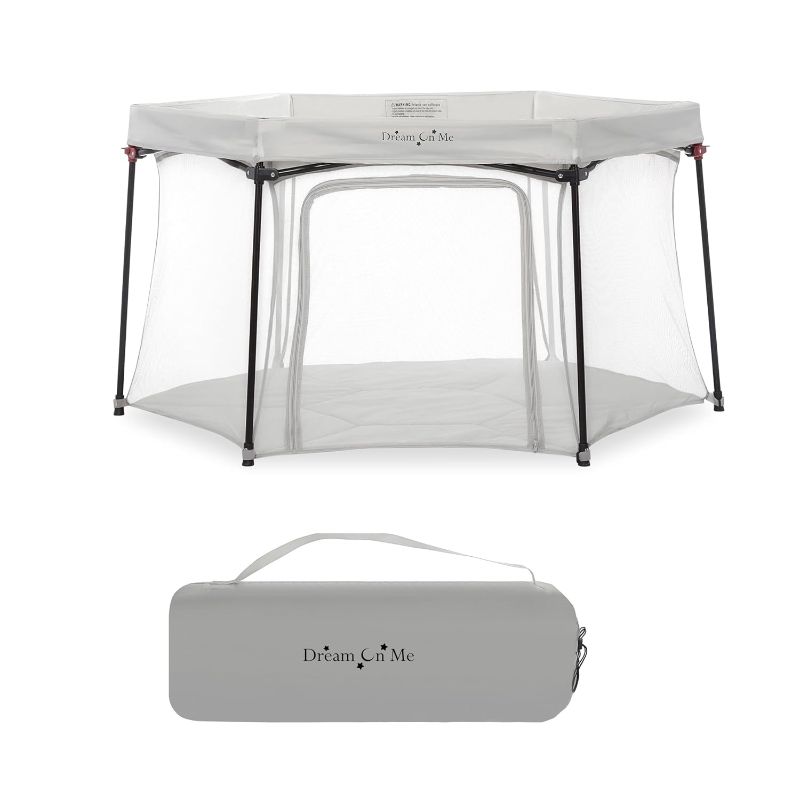 Photo 1 of Dream On Me Onyx Playpen in Grey, Baby Playpen, Portable and Lightweight, Playpen for Babies and Toddler - Comes with a Comfortable Padded Floor
