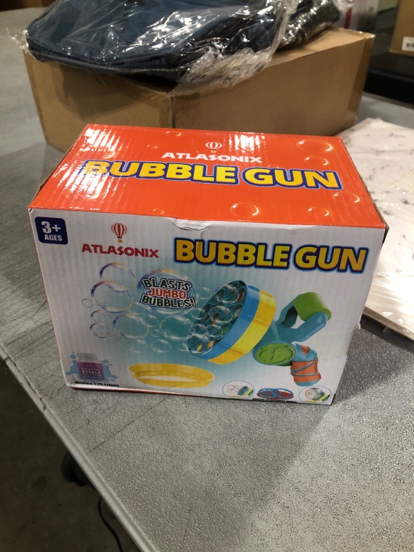 Photo 2 of Atlasonix Bubble Gun with Bubble Solution (60 oz), Bubble Blower for Kids - Bubble Guns for Toddlers, Bubble Toys, Bubble Blaster, Bubble Blaster, Bubble Blower for Toddlers