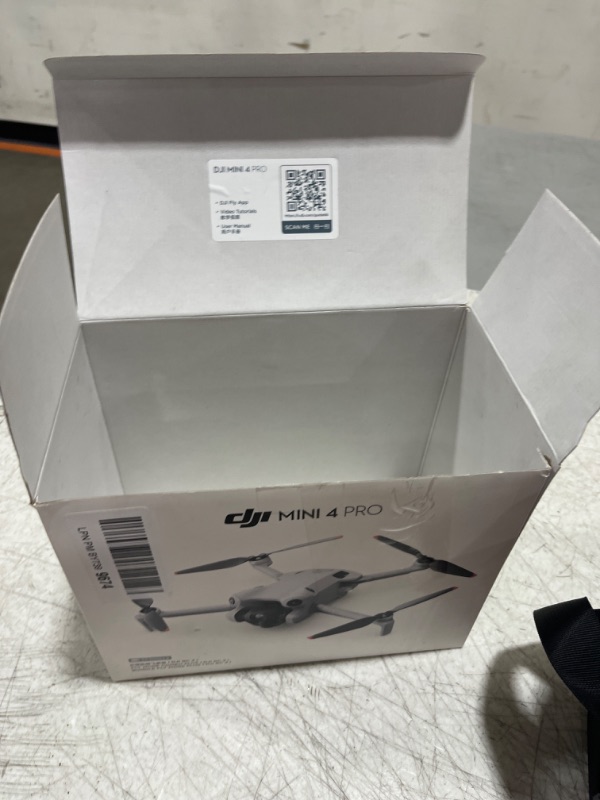 Photo 9 of **DOESN'T CONNECT TO SATELLITE, FOR PARTS ONLY** DJI - Mini 4 Pro Fly More Combo Plus Drone and RC 2 Remote Control with Built-in Screen - Gray - DOESNT CONNECT TO SATELLITE- MISSING POWER CORD - MISSING 1 BATTERY & BATTERY HOLDER ONLY HAS SHOWN IN PICTUR