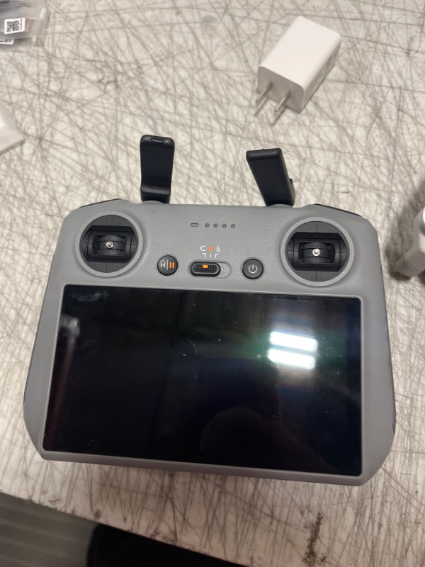 Photo 3 of DJI - Mini 4 Pro Fly More Combo Plus Drone and RC 2 Remote Control with Built-in Screen - Gray - DOESNT CONNECT TO SATELLITE- MISSING POWER CORD - MISSING 1 BATTERY & BATTERY HOLDER ONLY HAS SHOWN IN PICTURE - 