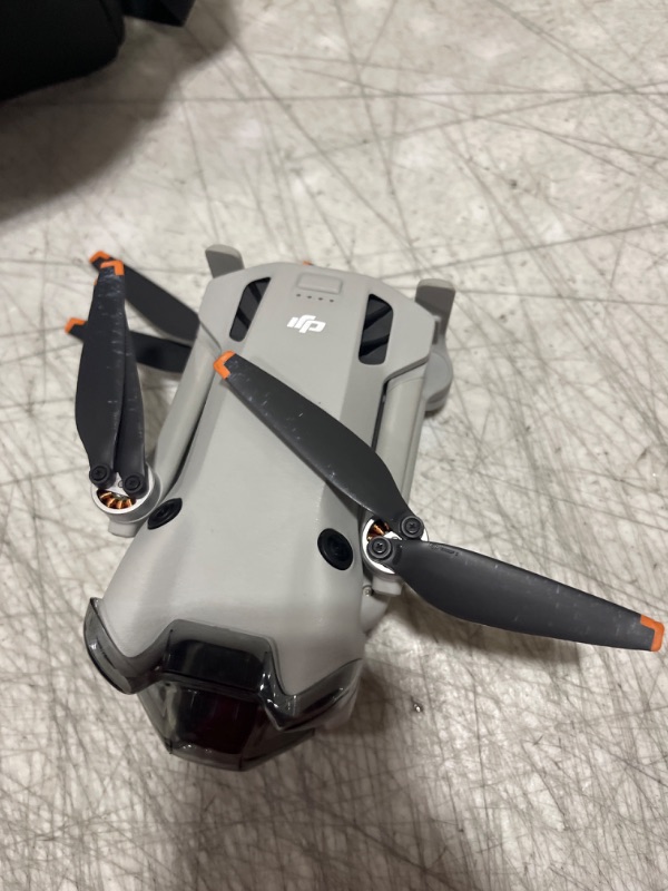 Photo 6 of **DOESN'T CONNECT TO SATELLITE, FOR PARTS ONLY** DJI - Mini 4 Pro Fly More Combo Plus Drone and RC 2 Remote Control with Built-in Screen - Gray - DOESNT CONNECT TO SATELLITE- MISSING POWER CORD - MISSING 1 BATTERY & BATTERY HOLDER ONLY HAS SHOWN IN PICTUR