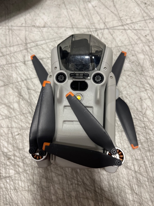 Photo 7 of **DOESN'T CONNECT TO SATELLITE, FOR PARTS ONLY** DJI - Mini 4 Pro Fly More Combo Plus Drone and RC 2 Remote Control with Built-in Screen - Gray - DOESNT CONNECT TO SATELLITE- MISSING POWER CORD - MISSING 1 BATTERY & BATTERY HOLDER ONLY HAS SHOWN IN PICTUR