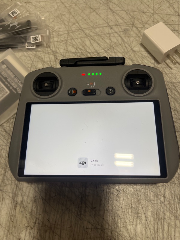 Photo 4 of **DOESN'T CONNECT TO SATELLITE, FOR PARTS ONLY** DJI - Mini 4 Pro Fly More Combo Plus Drone and RC 2 Remote Control with Built-in Screen - Gray - DOESNT CONNECT TO SATELLITE- MISSING POWER CORD - MISSING 1 BATTERY & BATTERY HOLDER ONLY HAS SHOWN IN PICTUR