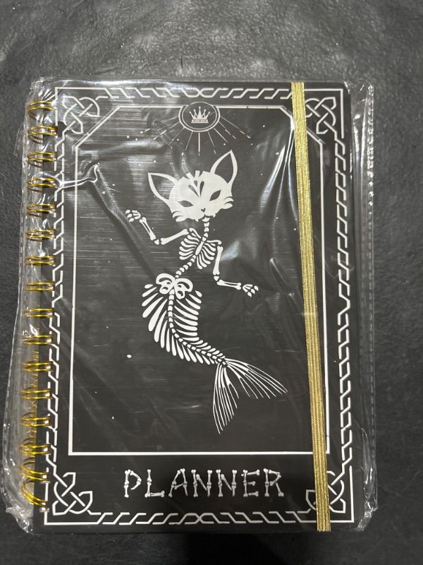 Photo 1 of 2024 Planner, 12-Month Weekly Monthly Planner from JAN.2024 to DEC.2024, 8.4" X 6", Planner Notebook with Spiral Bound, Stickers & Sticky Index Tabs, Fox-Fish Skull Black - 01