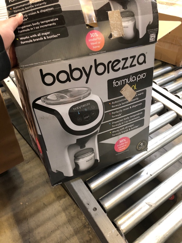 Photo 3 of Baby Brezza Formula Pro Mini Baby Formula Maker – Small Baby Formula Mixer Machine Fits Small Spaces and is Portable for Travel– Bottle Makers Makes The Perfect Bottle for Your Infant On The Go Formula Pro Mini Dispenser Machine