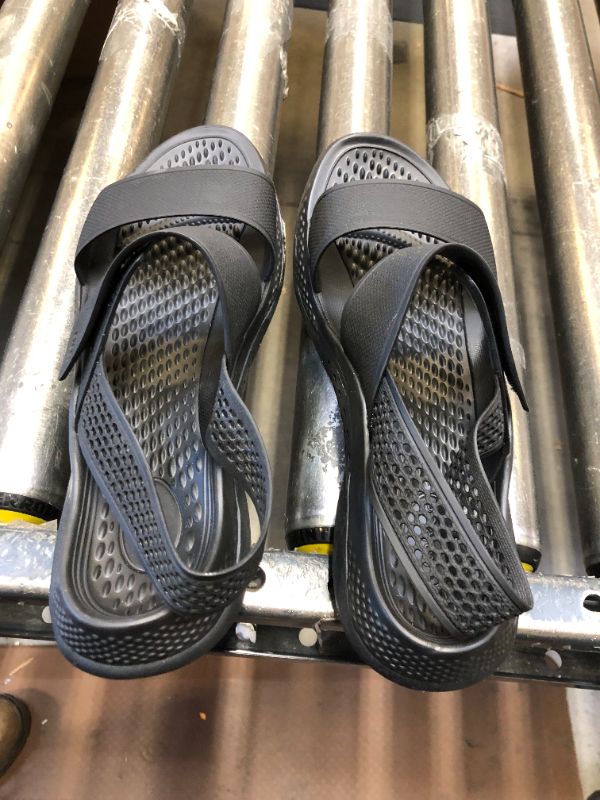 Photo 1 of WOMENS BLACK RUBBER SANDAL
SIZE 9