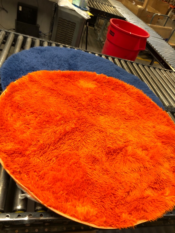 Photo 1 of 2 COUNT BLUE AND ORANGE FUZZY RUGS