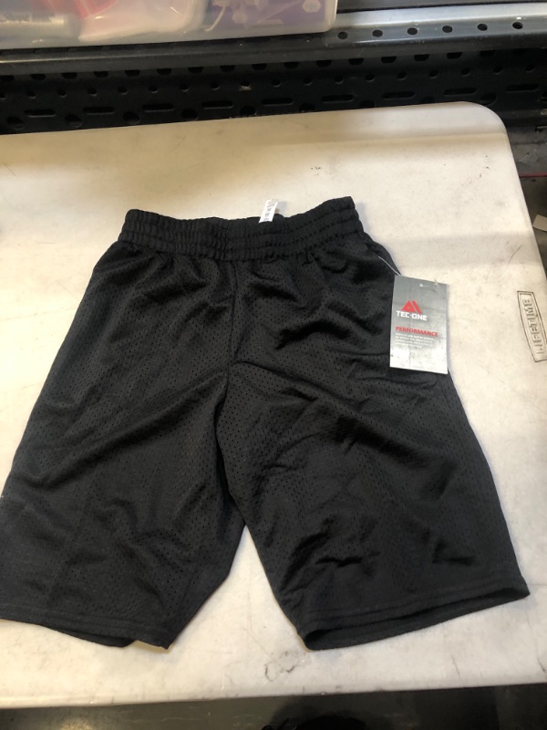 Photo 1 of boys size small basketball shorts 