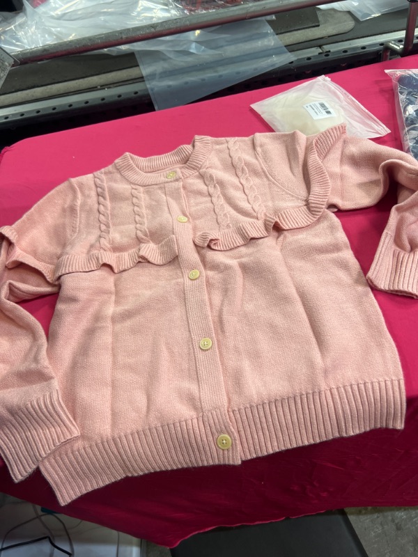 Photo 2 of Haloumoning Girls Knit Cardigan Sweaters Long Sleeve Button Down Ruffle Crewneck Outerwear
unknown size 
size appears to be 7-9 years 