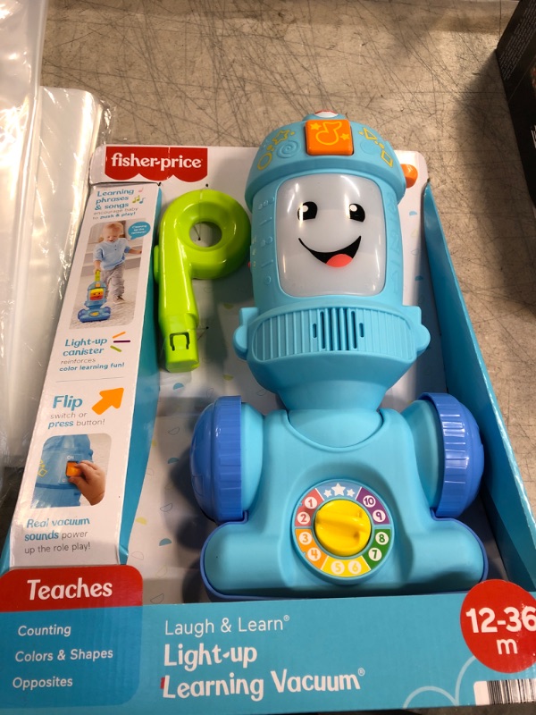 Photo 2 of Fisher-Price Laugh & Learn Toddler Toy Vacuum, Push Toy with Lights Music and Educational Songs, Light-Up Learning