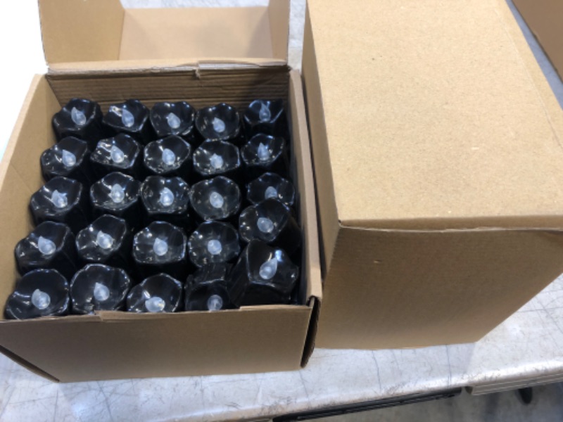 Photo 1 of 200 PIECE BLACK HALLOWEEN TEA LIGHT CANDLES