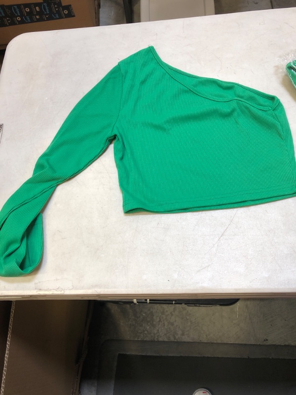 Photo 1 of green one sleeve shirt small