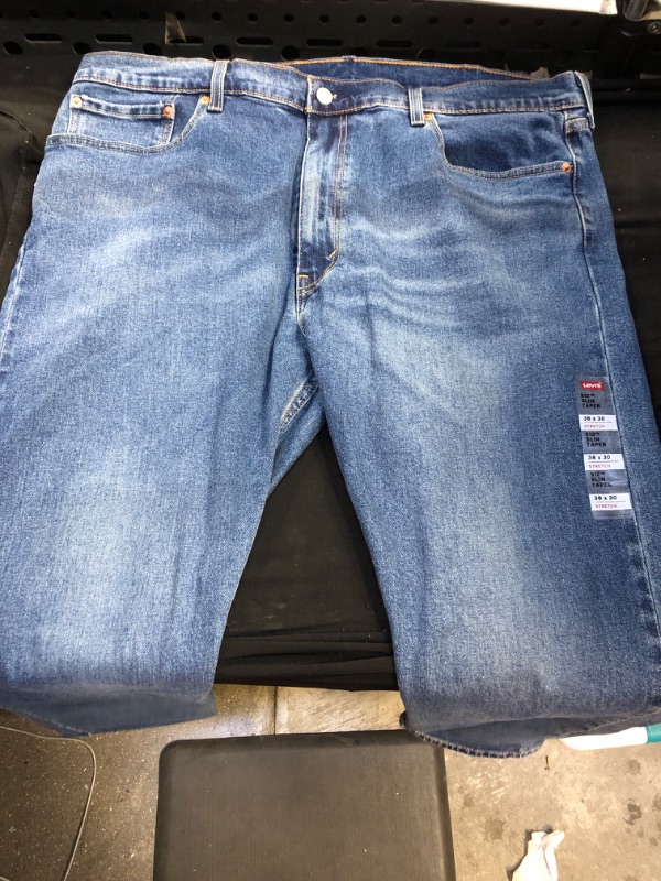 Photo 1 of LEVIS JEANS 
SIZE - 38X30 STRETCH JEANS 