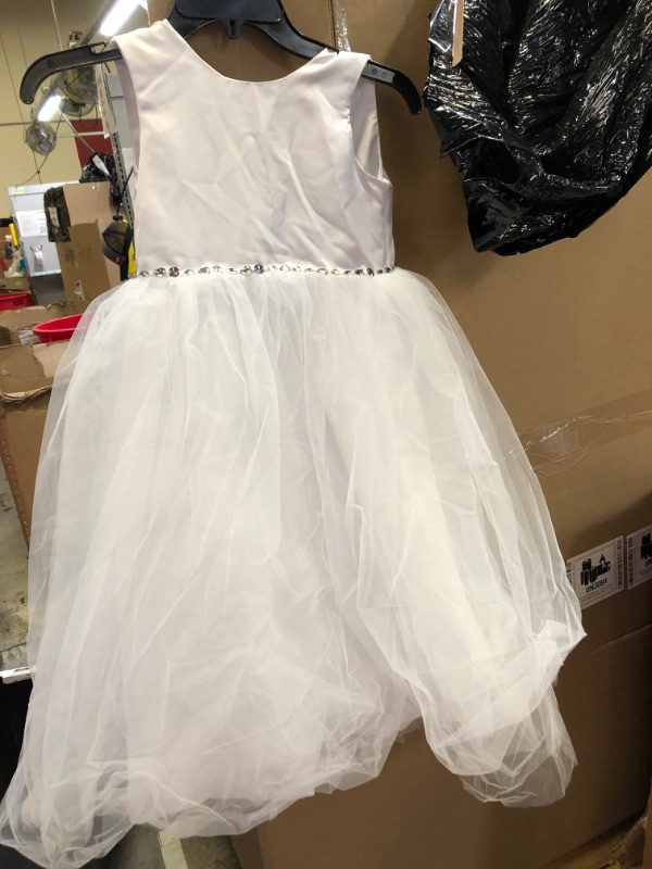 Photo 1 of WHITE BRIDAL DRESS FOR GIRLS 
SIZE UNKNOWN 
SIZE APPEARS TO BE - 5-7YRS 