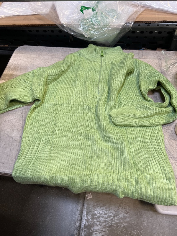 Photo 1 of GREEN LONG SLEEVE ZIP UP TURTLENECK SWEATER 
SIZE UNKNOWN 
SIZE APPEAR TO BE MEDIUM /LARGE 