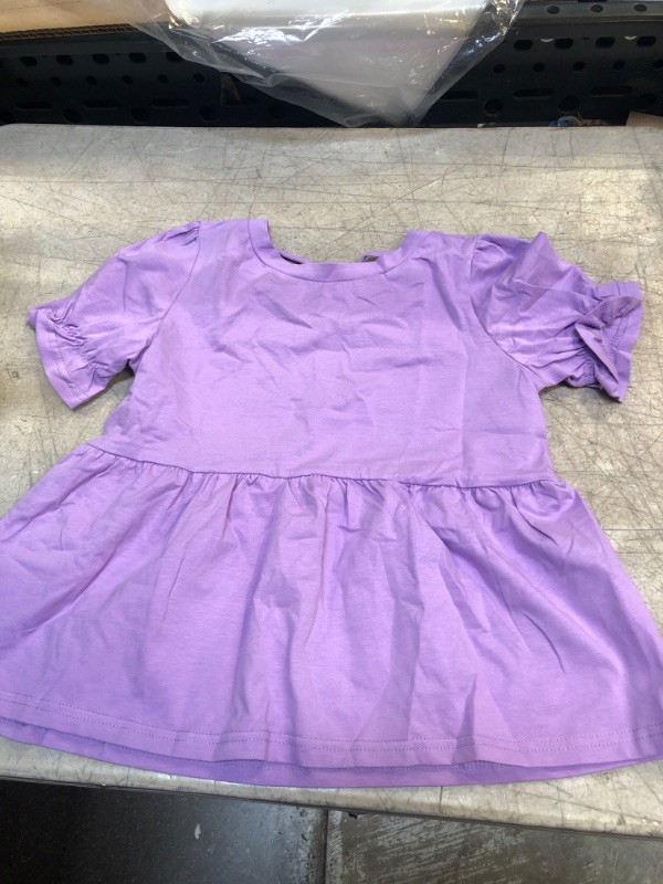 Photo 1 of  GIRLS PURPLE RUFFLE SHIRT 
SIZE UNKNOWN 
SIZE APPEARS TO BE 7-10YEARS 