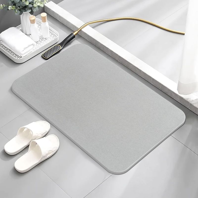 Photo 1 of AWW Stone Bath Mat, Diatomaceous Earth Bath Mat Stone, Non-Slip Stone Bath Mats for Bathroom, Fast-Drying Stone Bath Mat, Stone Shower Mat, 23.62x15.47
