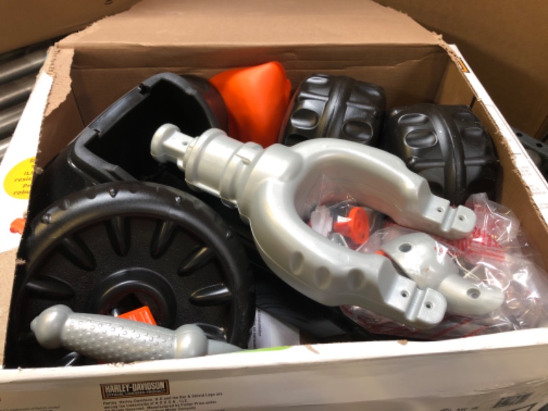 Photo 1 of Fisher-Price Harley-Davidson Tricycle with Handlebar Grips and Storage Area, Multi-Terrain Tires, Tough Trike [Amazon Exclusive]