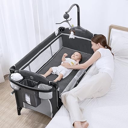 Photo 1 of ANGELBLISS 5 in 1 Baby Bassinet Bedside Sleeper, Rocking Bassinet for Baby, Easy Folding Portable Playards, Pack and Play with Mattress, Diaper Changer and Music Mobile
