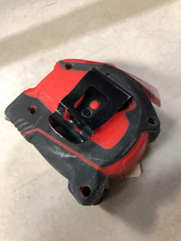 Photo 1 of red measuring tape 