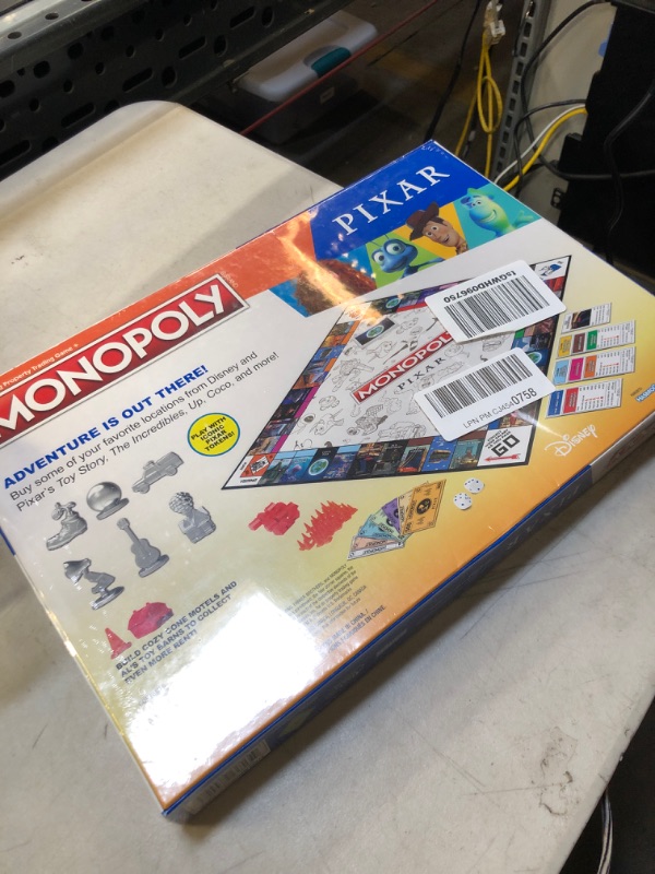 Photo 2 of Hasbro Gaming Monopoly: Pixar Edition Board Game for Kids 8 and Up, Buy Locations from Disney and Pixar's Toy Story, The Incredibles, Up, Coco, Lightyear, and More (Amazon Exclusive)