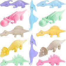 Photo 1 of  Slingshot Dinosaur Finger Toys, Mini Rubber Dino Figures Finger Sling Shot Toys, Flying Games Party Favors Gift Toy, Funny Gag Gifts for Kids Teens Boys