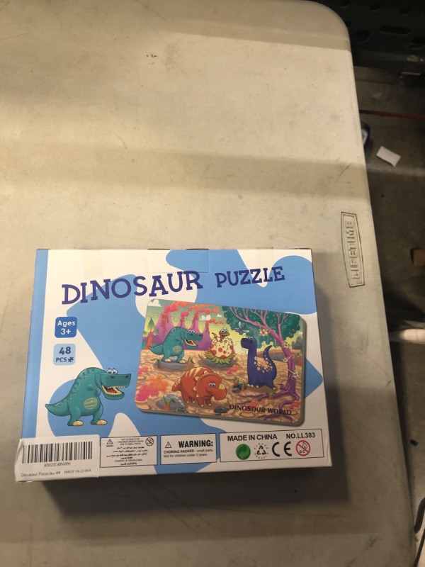 Photo 1 of DINOSAUR PUZZLE 