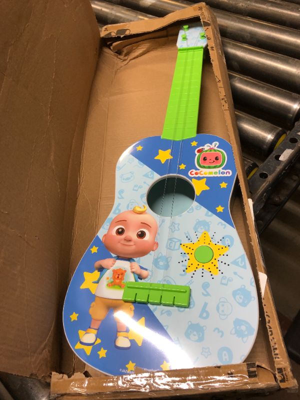 Photo 2 of CoComelon Musical Guitar by First Act, 23.5” Kids Guitar - Plays Clips of The ‘Finger Family’ Song - Musical Instruments for Kids, Toddlers, and Preschoolers