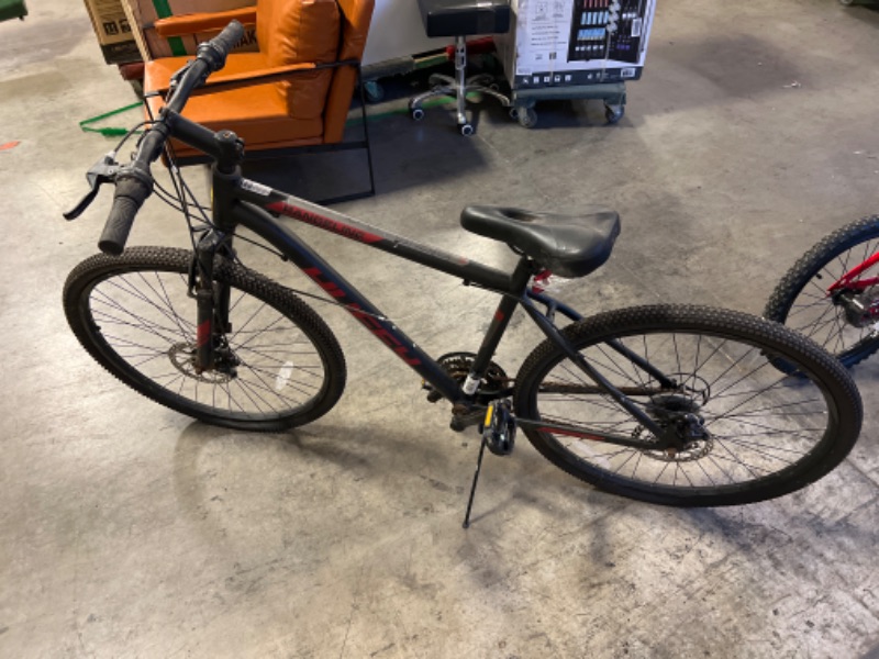 Photo 2 of **Front tire flat, seat missing lock, front wheel bent and forks loose, chain rusty** Huffy 27.5 in. Rangeline Men's Mountain Bikes, Black and Red
