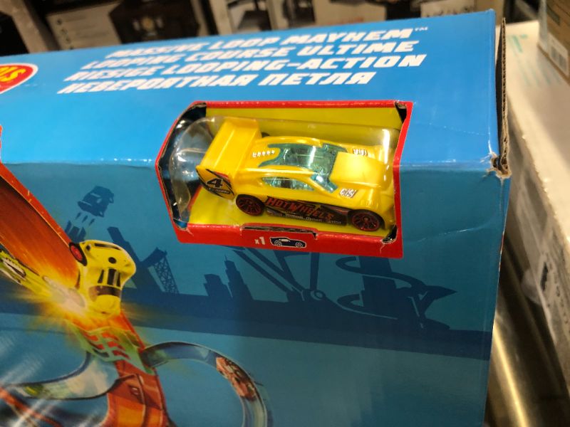Photo 1 of Hot Wheels Massive Loop Mayhem Track Set with Huge 28-Inch Tall Track Loop Slam Launcher, Battery Box & 1 Hot Wheels 1:64 Scale Car, Designed for Multi-Car Play, Gift for Kids 5 Years Old & Up SIOC/FFP Track Set