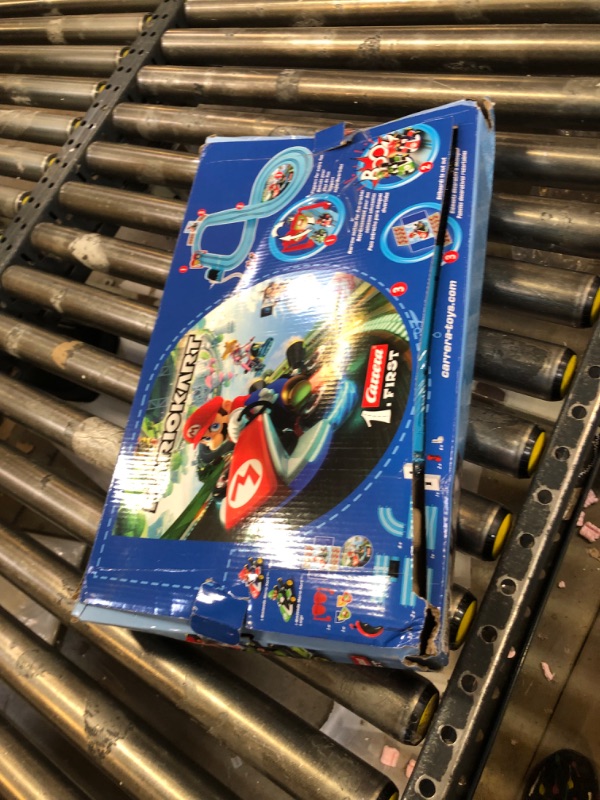 Photo 2 of Carrera First Nintendo Mario Kart Slot Car Race Track - Includes 2 Cars: Mario and Luigi and Two-Controllers - Battery-Powered Beginner Set for Kids Ages 3 Years and Up, 20063028 Mario Kart / Flippers