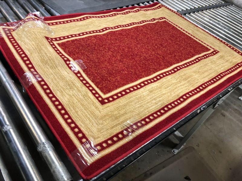 Photo 1 of 58"x40" red area rug 