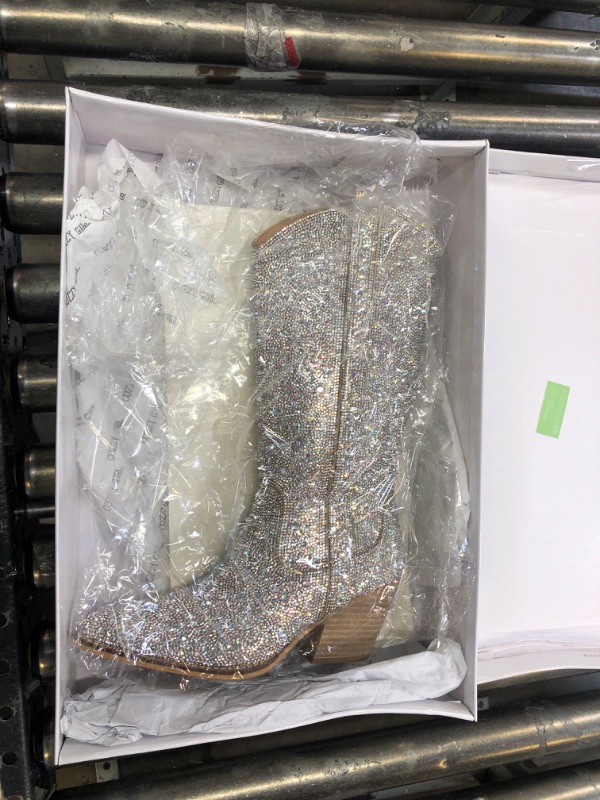 Photo 1 of +












COZZY GIRL Alice 12 Inches Women's Knee High Rhinestone Sparkling Crystal Stacked Heel Western Boots

