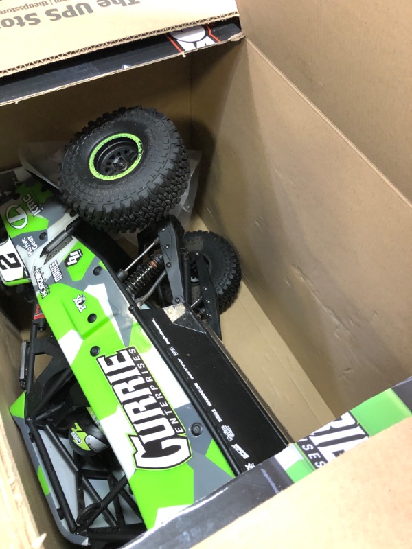 Photo 2 of Losi RC Truck 1/10 Hammer Rey U4 4 Wheel Drive Rock Racer Brushless RTR Battery and Charger Not Included with Smart and AVC Green LOS03030T2