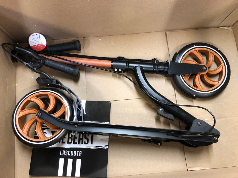 Photo 1 of LaScoota Kick Scooter for Kids Ages 6+, Teens & Adults, Lightweight, Big Sturdy Urethane Wheels. Adjustable Handlebar, Foldable Scooter for Indoor & Outdoor, Great Gift & Toy
