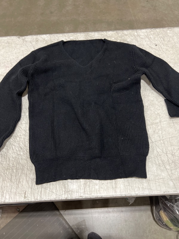 Photo 1 of Large black sweater 