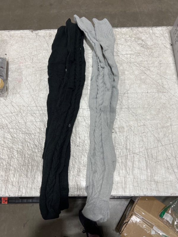 Photo 1 of 2 pairs of long socks. gray and black 