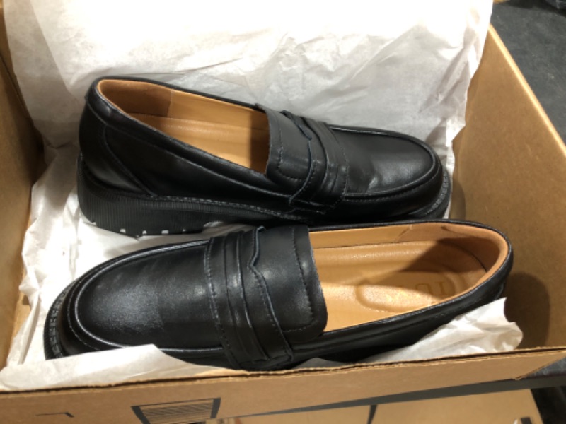 Photo 1 of Black dress shoes unknown size cannot locate