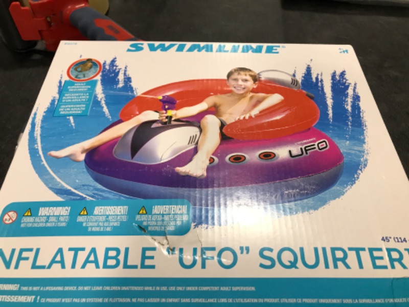 Photo 2 of SWIMLINE ORIGINAL Inflatable UFO Spaceship Pool Float Ride On With Fun Constant Flow Laser Ray Gun Water Squirter For Kids , Cool Retro Style, For Beach Ocean Pool Lake , Extra Thick Large Floatie Swimline UFO Spaceship Squirter