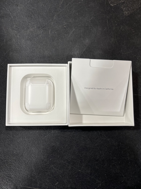 Photo 2 of AirPods with Charging Case - FACTORY SEALED - OPENED FOR PICTURES 