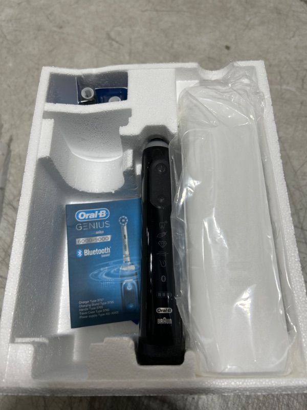 Photo 2 of Oral-B Pro Smart Limited Power Rechargeable Electric Toothbrush with (2) Brush Heads and Travel Case, Black