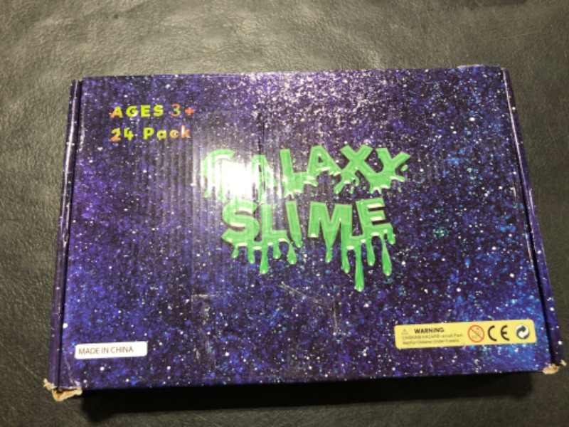 Photo 1 of AGES 3+ GALAXY SLIME TOY 