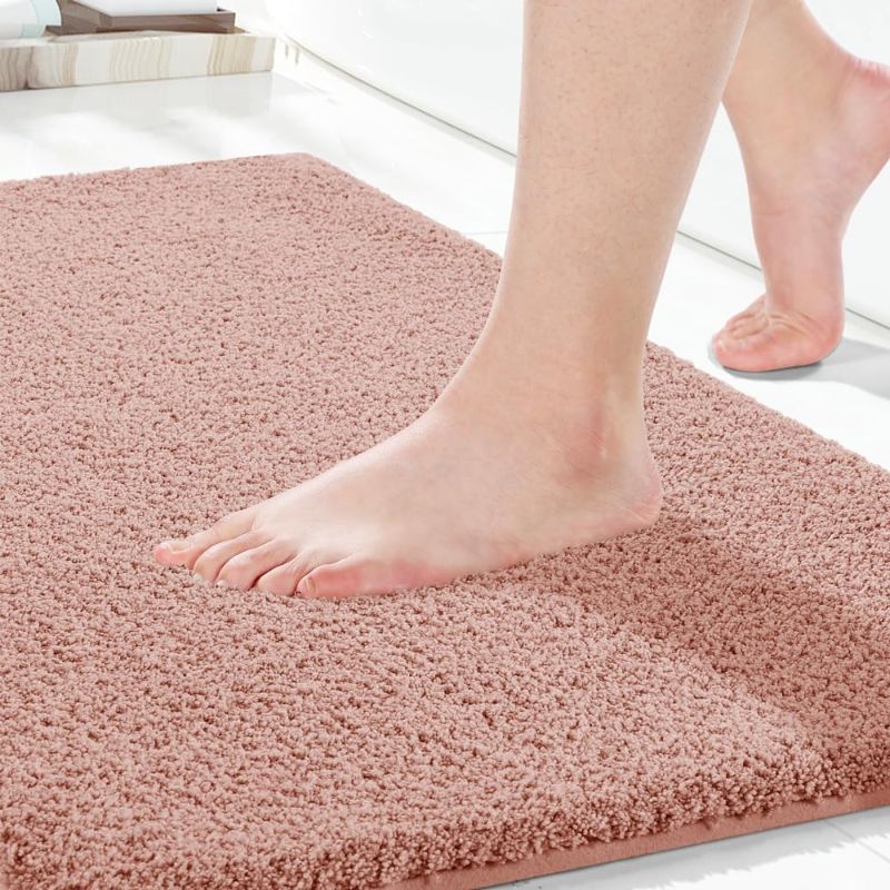 Photo 1 of Yimobra Bathroom Rugs Mat, Extra Soft Comfortable Bath Rugs, Non-Slip, Water Absorbent and Thick Bathroom Floor Mats, Machine Washine, Shaggy Rugs for Shower Bathtubs, 24"x17", Pure Pink

