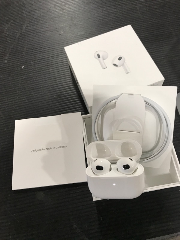 Photo 2 of Apple AirPods (3rd Generation) Wireless Earbuds with Lightning Charging Case